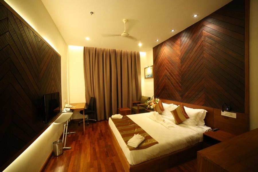 Woodies Bleisure Hotel Кожикод Екстериор снимка