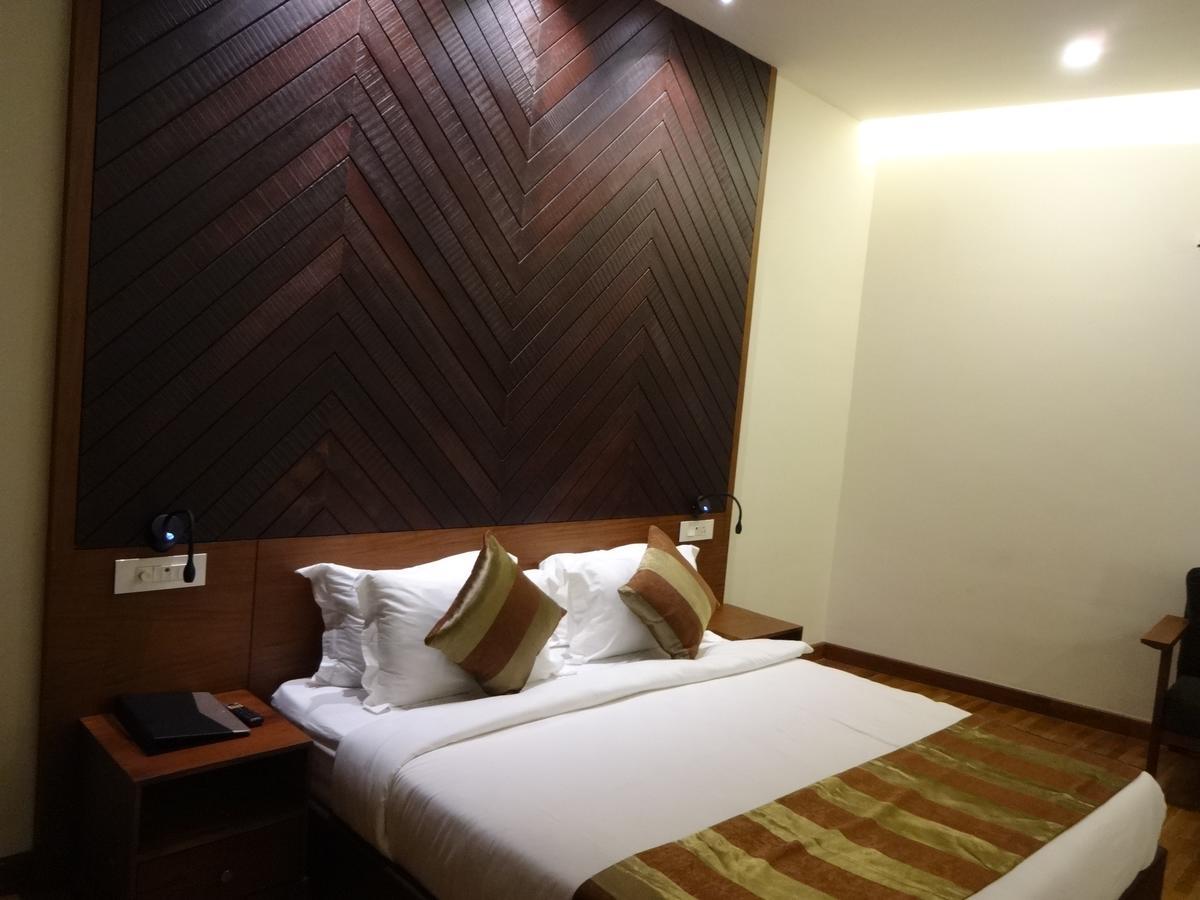 Woodies Bleisure Hotel Кожикод Екстериор снимка
