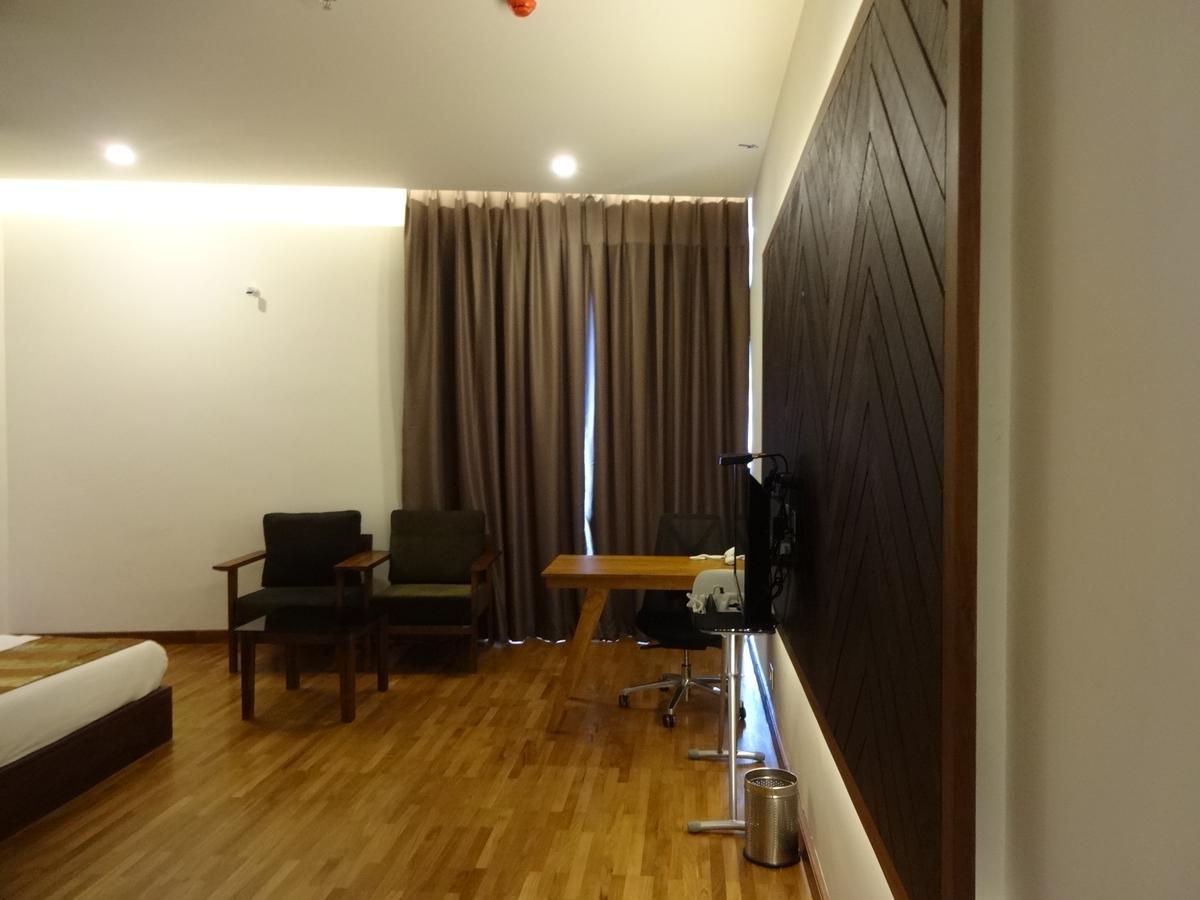 Woodies Bleisure Hotel Кожикод Екстериор снимка