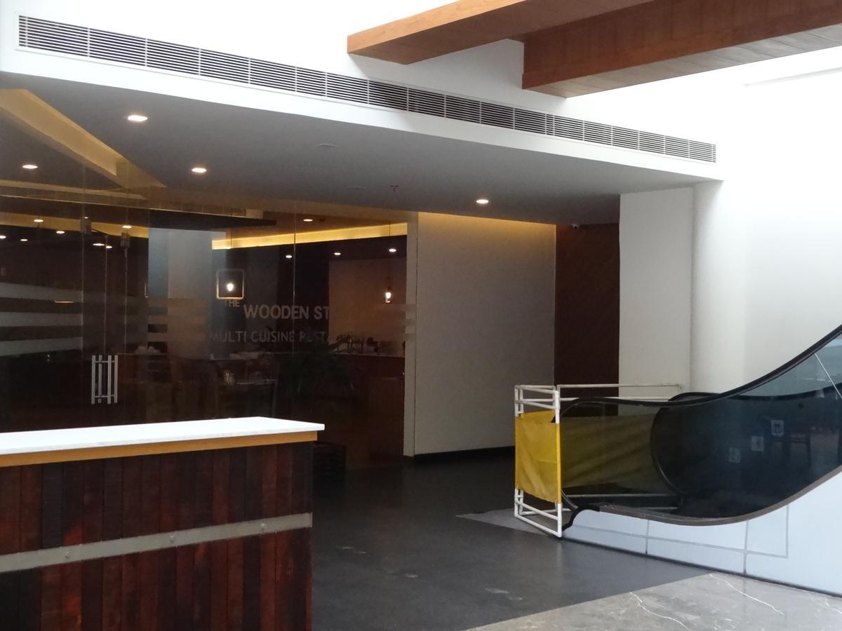 Woodies Bleisure Hotel Кожикод Екстериор снимка